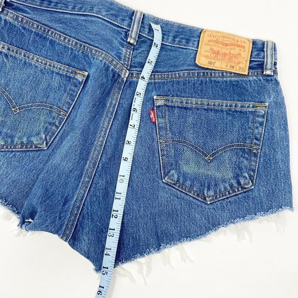 LEVIS | Distressed Denim Cut-Off Shorts - Picture 8 of 10